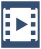 A white icon showing a movie tape reel with a play icon in the center. The icon is on a dark blue colored background.